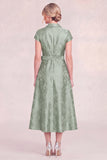 A Line Green Floral Jacquard Shawl Lapel Mother of the Bride Dress with Short Sleeves