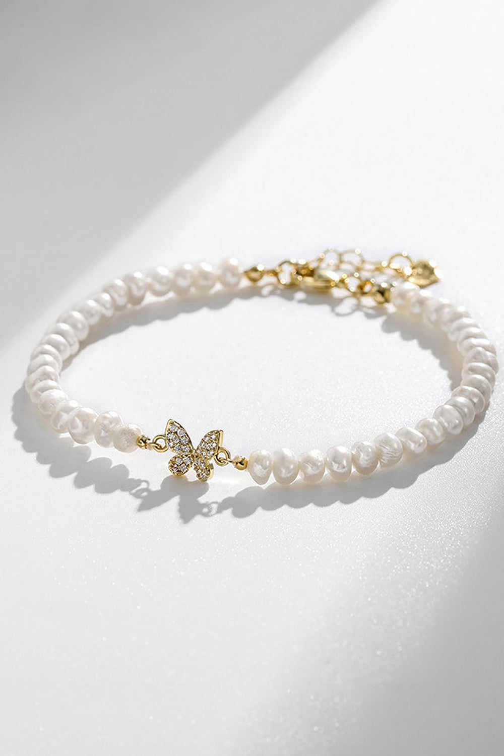 White Cultured Freshwater Full Pearl Bracelet with Rhinestone Butterfly